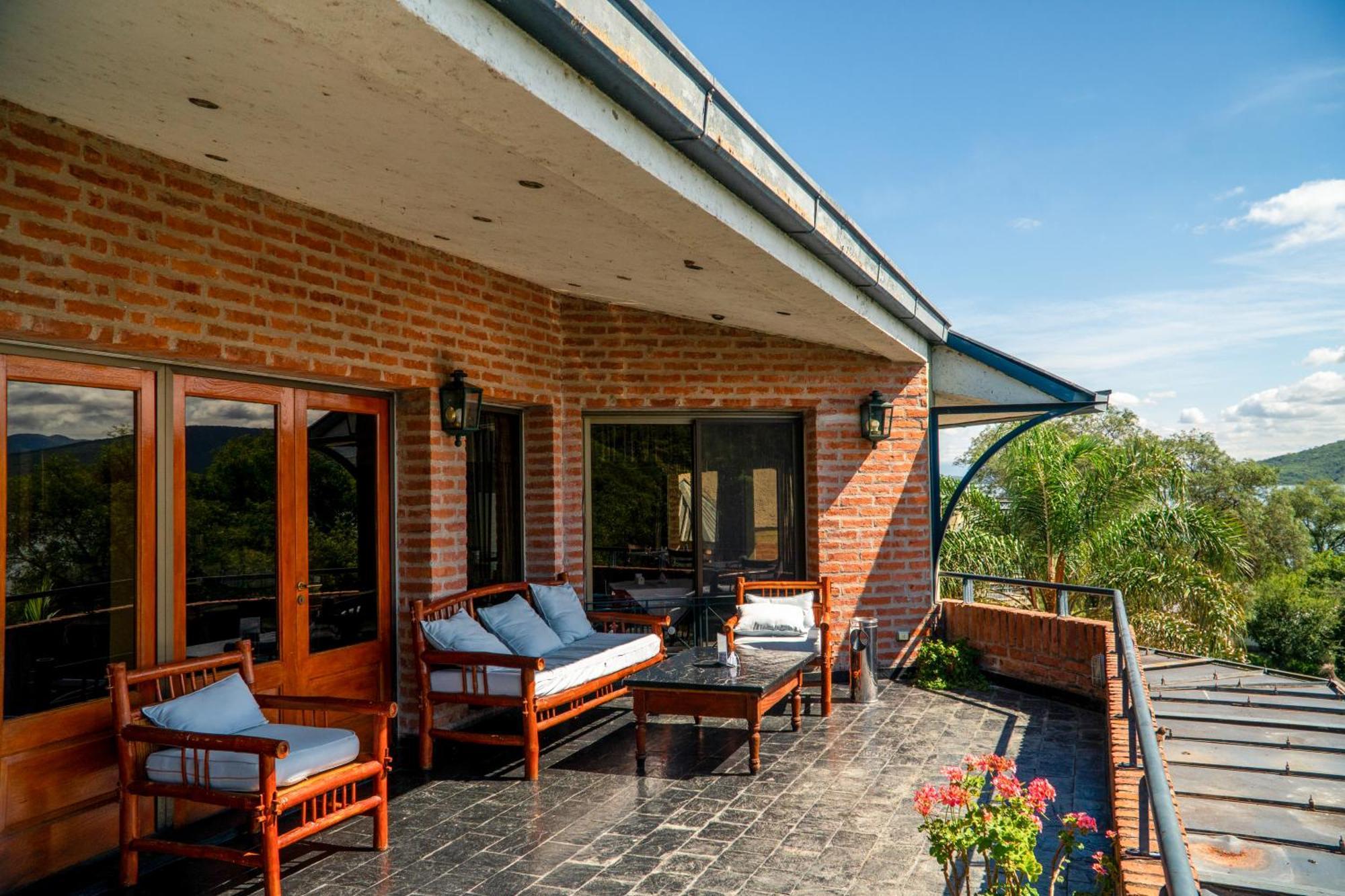 Hotel Del Dique Cabra Corral Extérieur photo